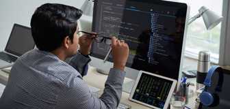 Man cleaning eyeglasses